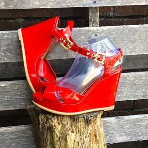 Sexy red Carlos Santana’s heels